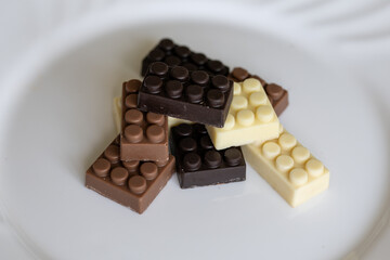 Bars of chocolate in the shape of blocks.