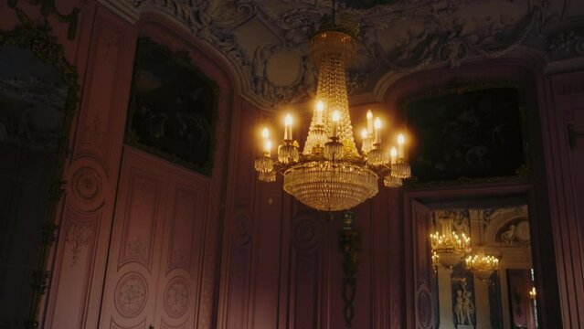 Beautiful vintage chandelier in the Benrath Castle hall.