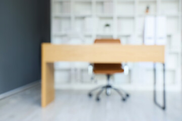 Blurred view of modern office with workplace