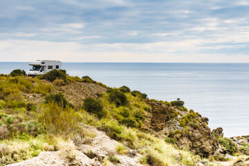 Fototapeta na wymiar Camper on cliff, coast in Spain