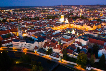 Scenic aerial view of old town of Ceske Budejovice with central square, Black tower and Cathedral of St Nicholas at dusk, Czech Republic