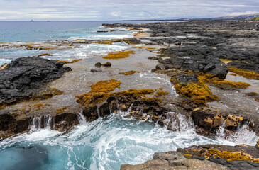 Obraz premium Tide Pools and The Rugged Volcanic Coastline on Hoona Bay, Hawaii Island, Hawaii, USA