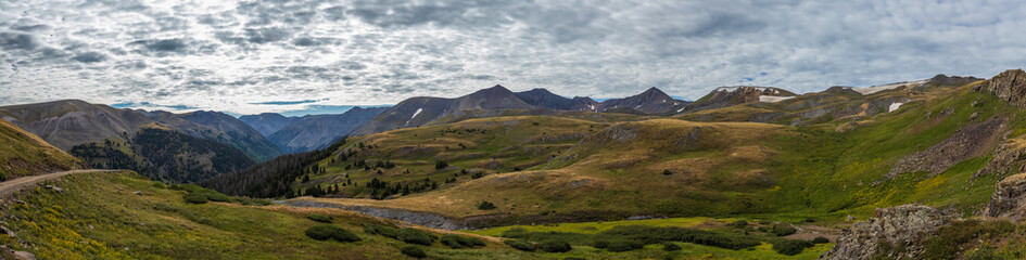 Fototapeta na wymiar Mountain tundra meadow panorama with overcast morning skies