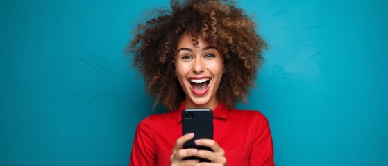 Generative AI : Excited trendy female with hand on cheek smiling and reading great news on smartphone against red background - obrazy, fototapety, plakaty