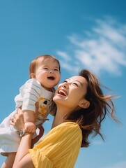 Generative AI : happy harmonious family outdoors mother throws baby up laughing and playing in the summer on the nature