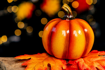 pumpkin with halloween smiley face on dark background