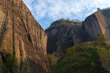 Close up on Rock formations lining the nine bend river or Jiuxi in Wuyishan