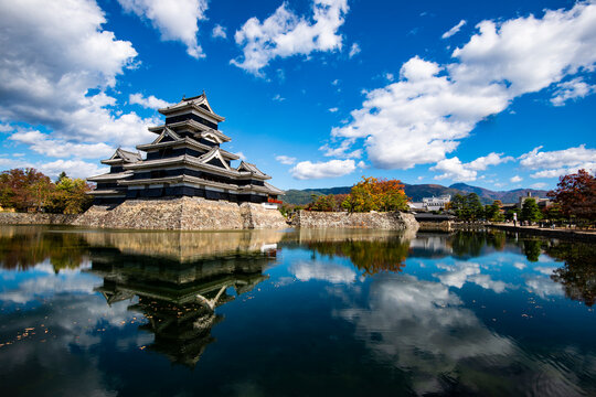 Uchibori moat and Matsumoto Castle tower, Japan