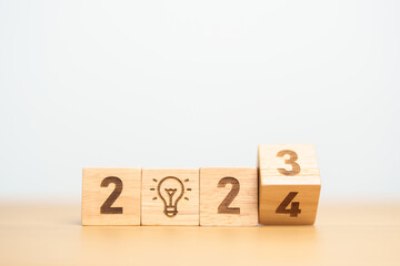 2024 block with lightbulb. Business Idea, Creative, Thinking, brainstorm, Goal, Resolution,...