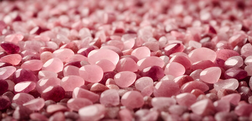 Fototapeta premium Rose Quartz stones on blurred background