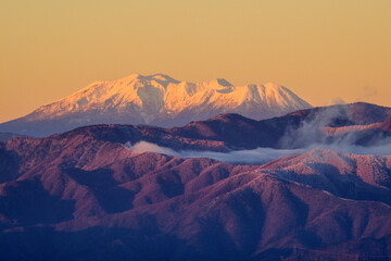 Morning glow of Mt. Ontake seen from Takabotchi Plateau, Japan,Nagano Prefecture