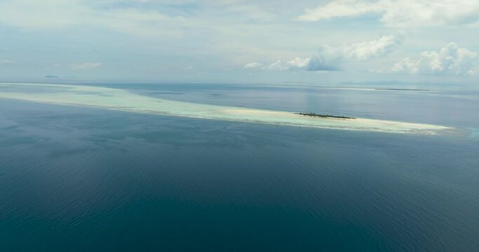 Timba Timba island with beach and coral reef. Tun Sakaran Marine Park. Borneo, Sabah, Malaysia.