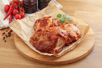 Marinated chicken leg in tomato sauce