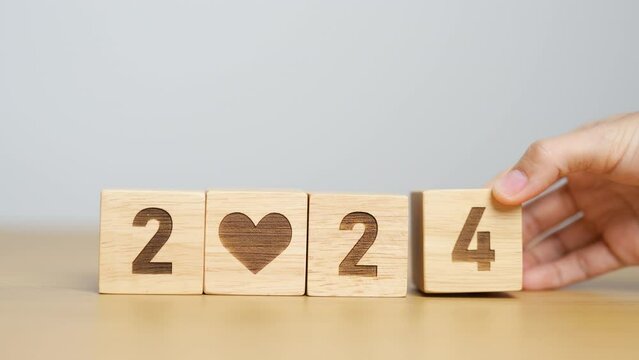 Happy New Year 2024 with heart block for health care, love, organ donation, resolution, charity, happy family, wellbeing and insurance concepts
