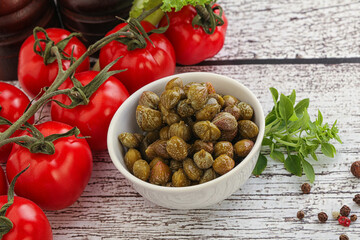Marinated green capers in the bowl