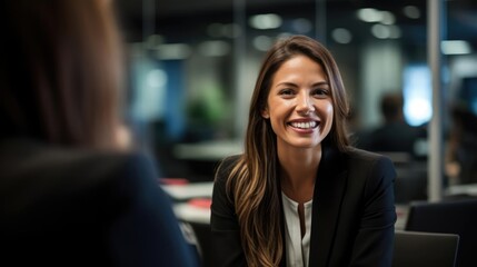 Portrait of a woman at a client meeting presenting project milestones ensuring client satisfaction