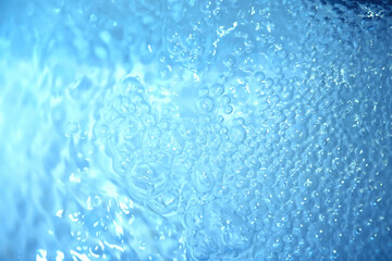 Obraz premium Blue water texture. Bubbles and bubbling water.