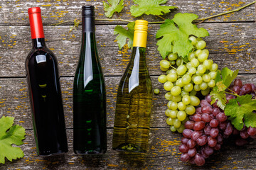Wine bottles and grape