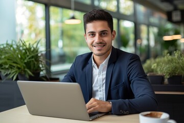 Fototapeta premium Handsome Latin Businessman Working with Computer, Male Manager Works in Modern Office, Analysis Data Statistics and Business Planning.