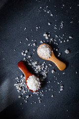 Coarse salt on a dark background.