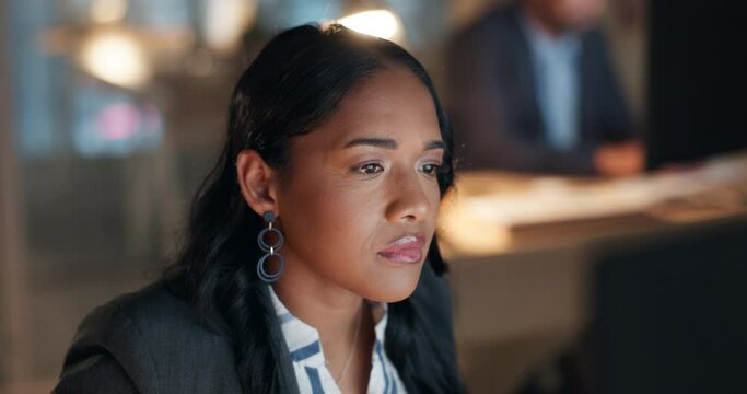 Reading online, thinking and woman in office with computer email, report or review at night. Market research, analytics and business insight at overtime and businesswoman checking article on website.