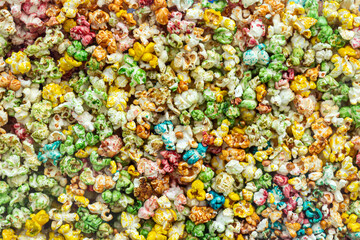 Multicolored delicious sweet popcorn background