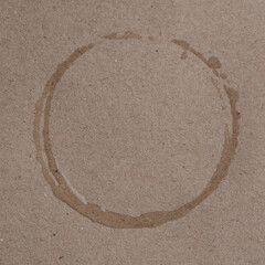 Cardboard texture with wet spots. Brown cardboard with round wet water stains