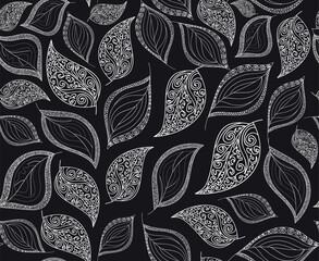 Beautiful decorative vector seamless pattern with hand drawn autumn leaves, linear ornaments