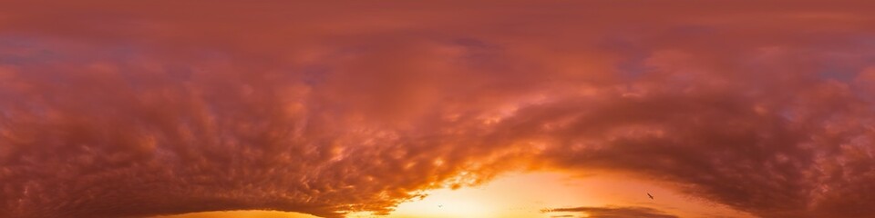 Fototapeta premium Sunset sky panorama with dramatic bright glowing pink Cumulus clouds. HDR 360 seamless spherical panorama. Full zenith or sky dome for 3D visualization, sky replacement for aerial drone panoramas.