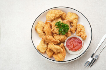 Crispy chicken fillets (ayam goreng tepung) with chilli sauce

