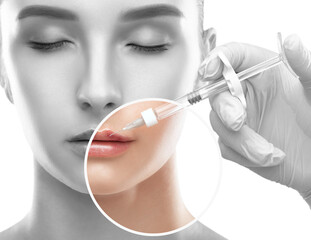 Cosmetologist does injections for lips augmentation anti wrinkle injections on the face of a...