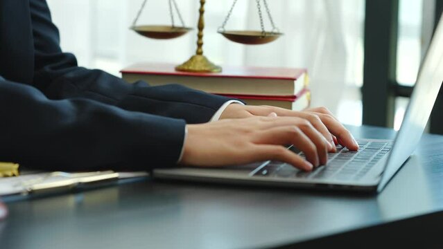 Legal consultant and real estate attorney lawyer read the building lease contract signing agreement for local business.