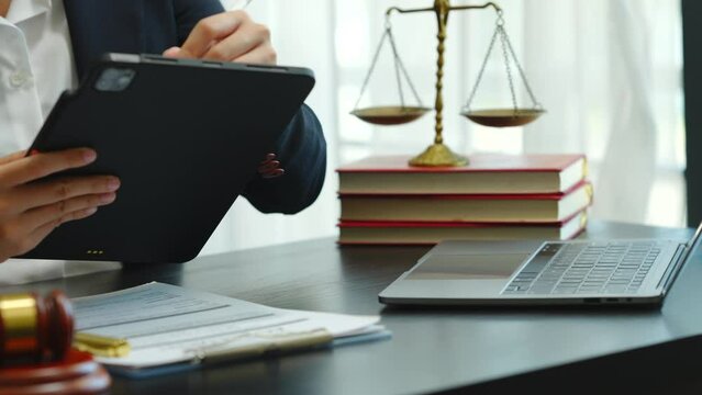 Legal consultant and real estate attorney lawyer read the building lease contract signing agreement for local business.