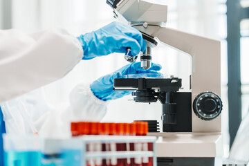 Close up scientist conducting precise virus lab test, scientific methodology, microbiologist conducting virus detection and testing in progress