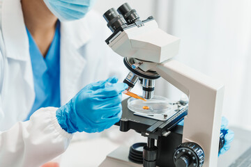 Close up scientist conducting precise virus lab test, scientific methodology, microbiologist conducting virus detection and testing in progress