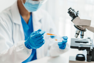 Close up scientist conducting precise virus lab test, scientific methodology, microbiologist conducting virus detection and testing in progress