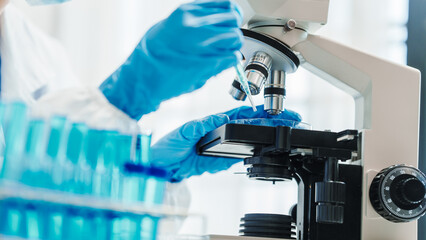 Close up scientist conducting precise virus lab test, scientific methodology, microbiologist conducting virus detection and testing in progress