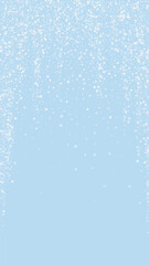 Snowfall overlay christmas background. Subtle flying snow flakes and stars on light blue winter backdrop. Festive snowfall overlay. Vertical vector illustration.