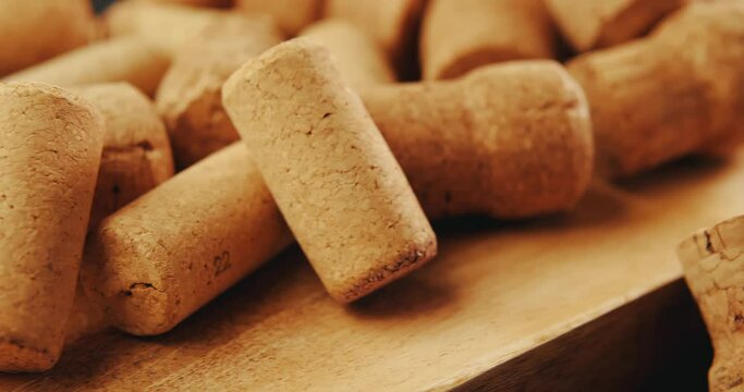 Wine corks on an old vintage wooden board.