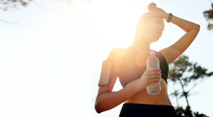 Nature mockup, running or woman drinking water in park after training, workout or exercise to hydrate. Sunshine, fitness space or tired girl with bottle for healthy liquid hydration on resting break