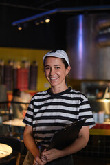 Female Employee Happily Smiling in Profile Shot