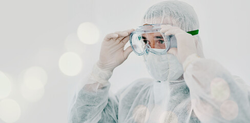 PPE, person goggles and safety suit of lab worker and healthcare professional in hospital or...