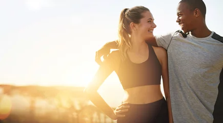 Rolgordijnen Couple, fitness and banner with sun, hug and happiness outdoor, mockup space and wellness. Love, care and trust, interracial exercise friends and lens flare, smile with workout together and healthy © Valerie M/peopleimages.com