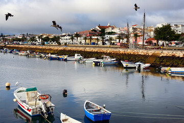 Lagos, Algarve, Portugal, Europe, boats moored at shores of Bensafrim river, Avenida dos...