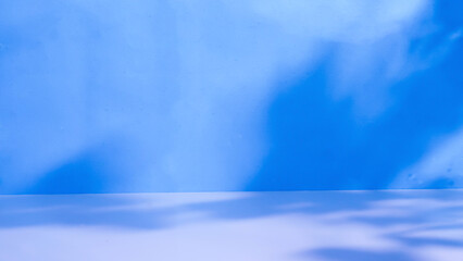 Abstract pastel blue studio background for product presentation, copy space