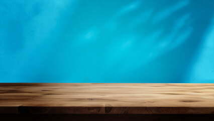 Empty wooden table for product presentation on an abstract blue background