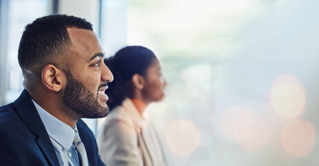 Face, smile and a business man in a conference for training or coaching during a workshop in the office. Happy, seminar and corporate employee in the workplace to listen to a presentation or lecture