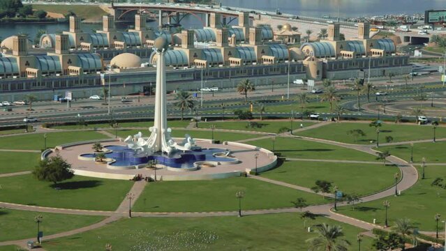 Sharjah Al Ittihad Square Park Monument in the early morning 