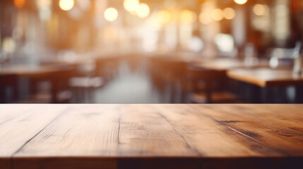 Empty white wooden table for product placement or montage with focus to table top in the foreground, with a restaurant in the background, its colors and details softened by a bokeh effect.