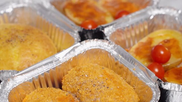 Rotating baked chicken and potatoes